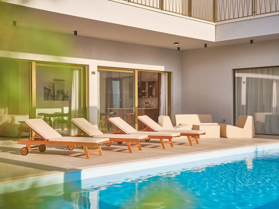 Swimming Pool, Wood, Interior Design, Outdoor Furniture, Resort, Floor, Flooring, Furniture, Composite Material, Apartment