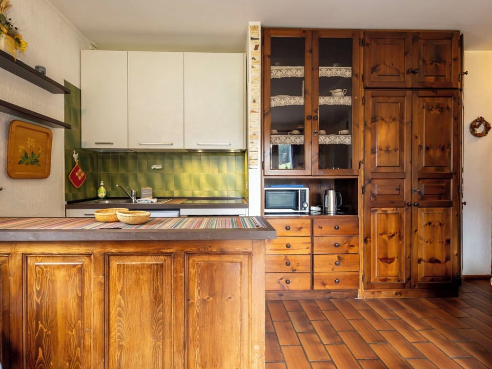 Cabinetry, Furniture, Kitchen, Flooring, Countertop, Interior Design, Wood, Drawer, Cupboard, Floor
