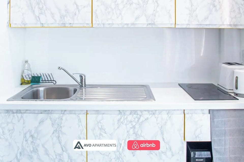 Kitchen at Avo Apartments Short Lets & Serviced Accommodation