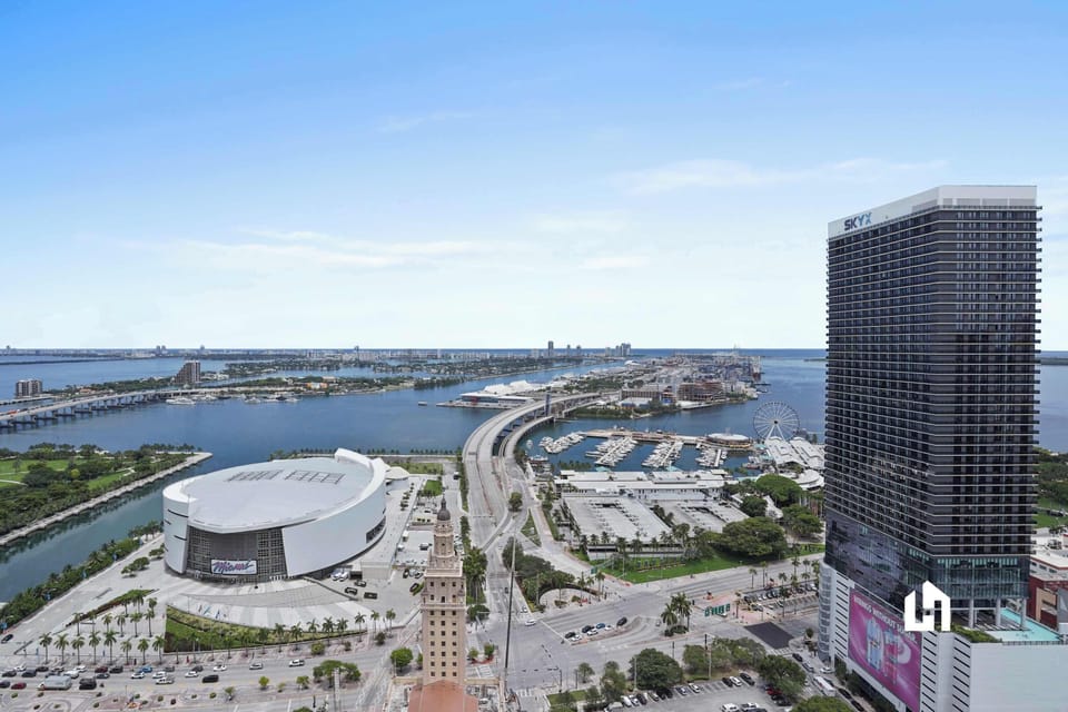 Panoramic city views, including the vibrant waterfront.