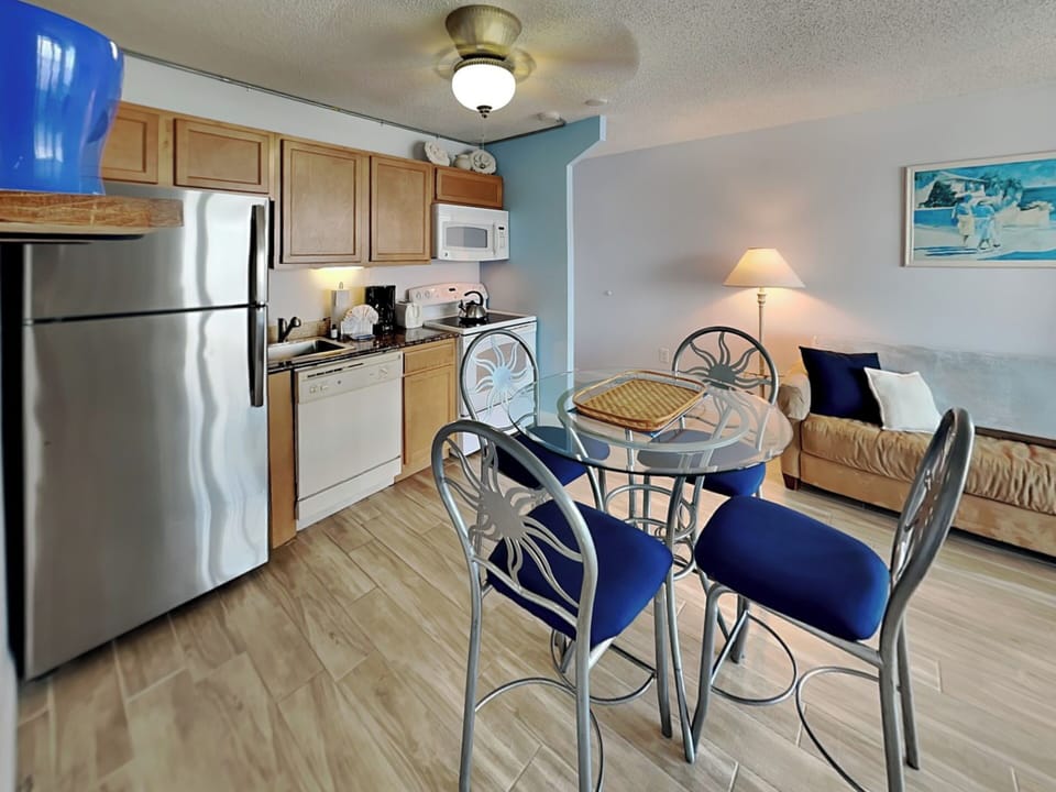 Fully Equipped Kitchen + Dining Area - Seating for Four