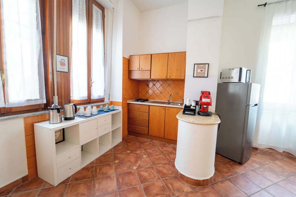 Fridge, microwave, stovetop, espresso maker