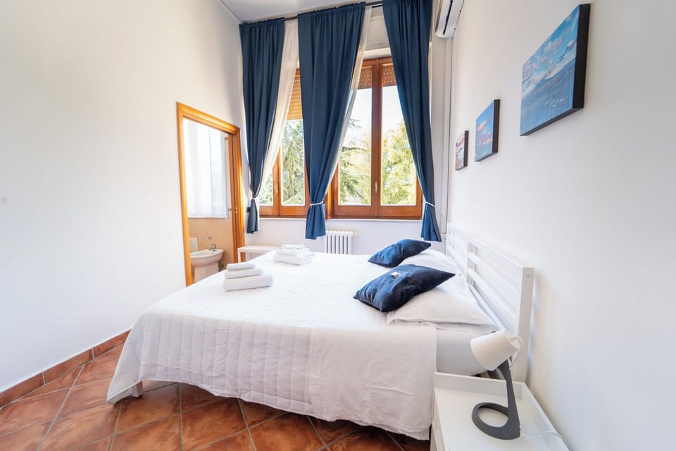 Double Room, Garden View | Desk, laptop workspace, blackout drapes, iron/ironing board