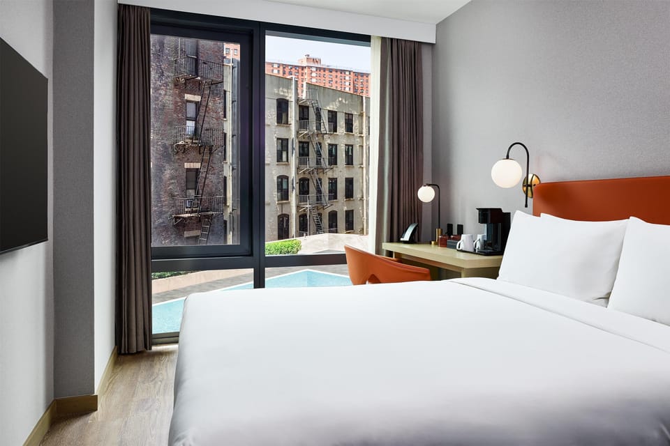 Room, 1 Queen Bed, Pool View | In-room safe, iron/ironing board, free WiFi, bed sheets