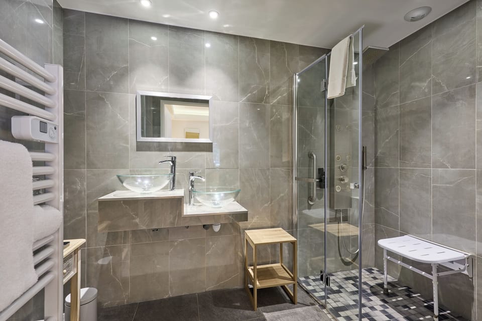 Signature Double Room | Bathroom | Eco-friendly toiletries, hair dryer, towels