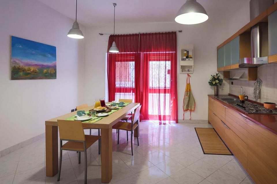 Full-size fridge, oven, stovetop, cookware/dishes/utensils
