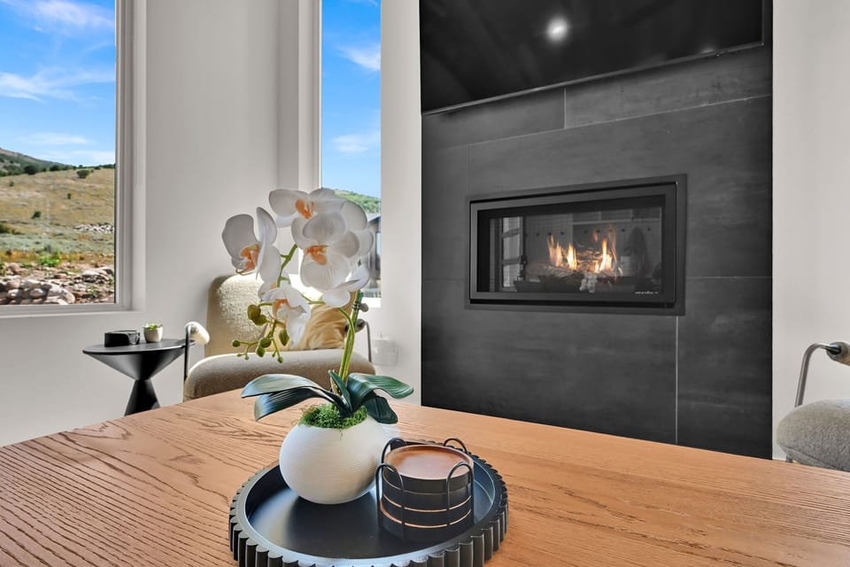 Dining Area with Fireplace & Mountain Views