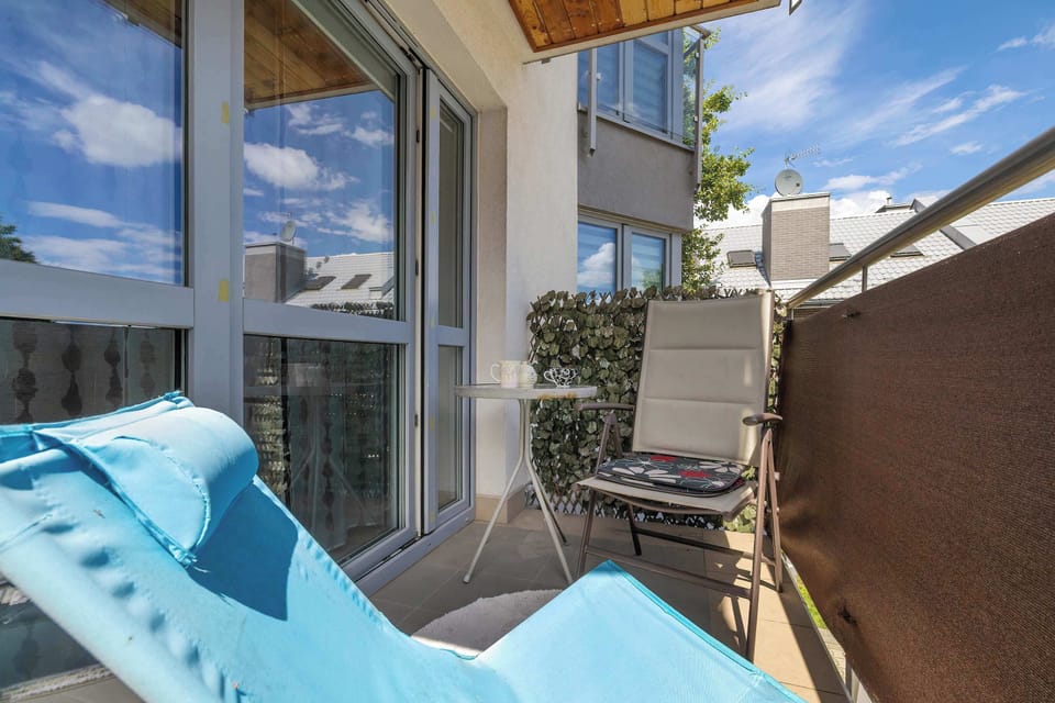 Balcony with seating – Private outdoor space for morning coffee or evening relaxation.