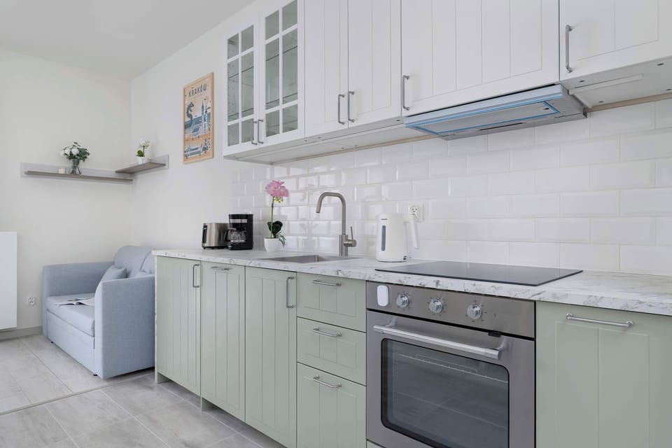 The fully equipped kitchenette includes everything you need for a home-cooked meal.