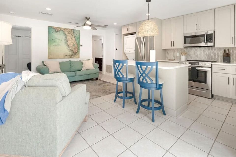 private 1 bedroom bungalow with a boat dock, resorts style heated pool, and even a putting green