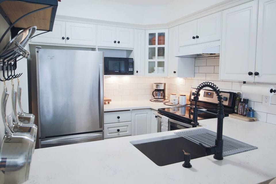 Fully stocked kitchen with modern appliances