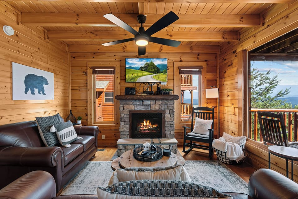 Plenty of seating with gorgeous views around the warm fireplace. 