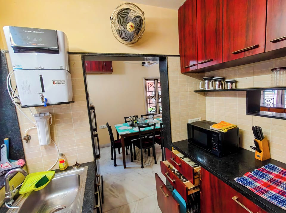 KITCHEN EQUIPED WITH WATER PURIFIER , GAS STOVE ,CHIMNEY, MICROWAVE OVEN, FRIDGE