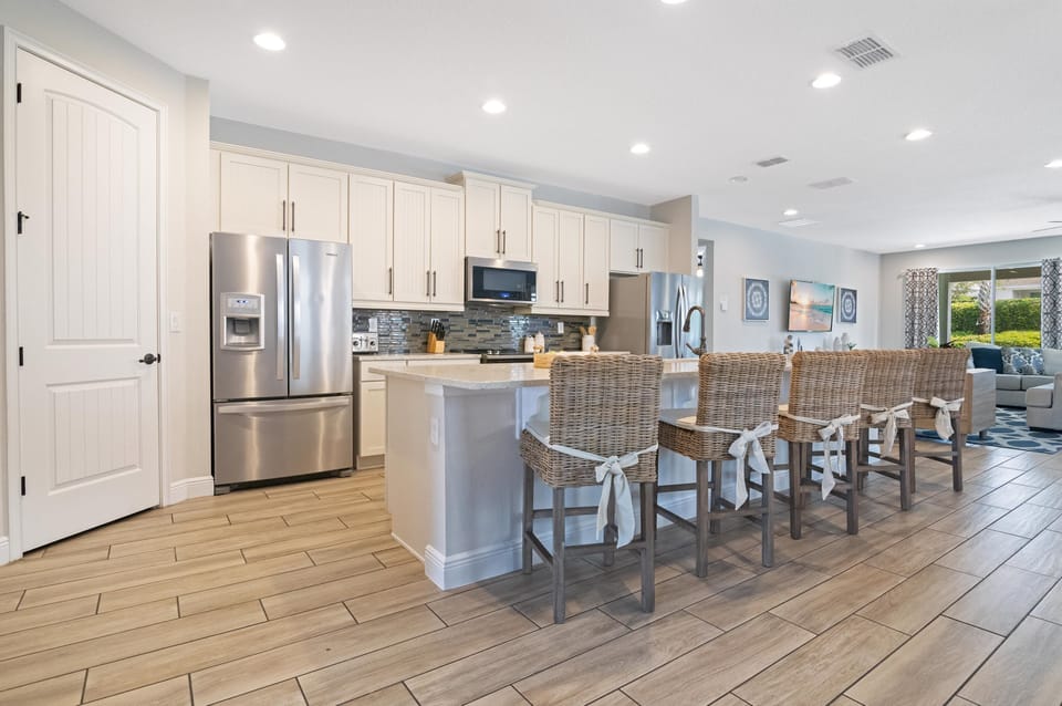 Stunning dining setup with natural light and stylish décor. A beautiful spot to plan your Orlando days.