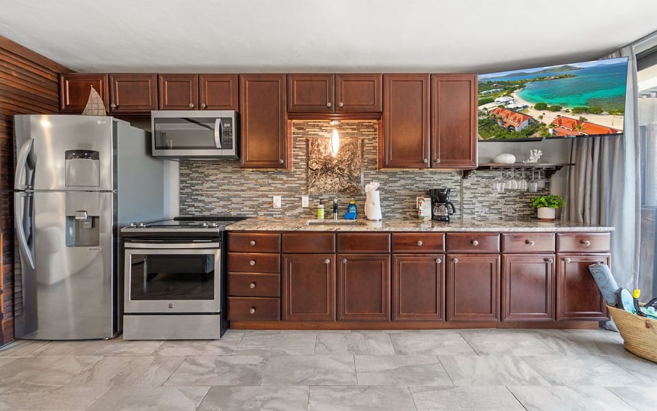 Full size appliances for cooking meals in the condo