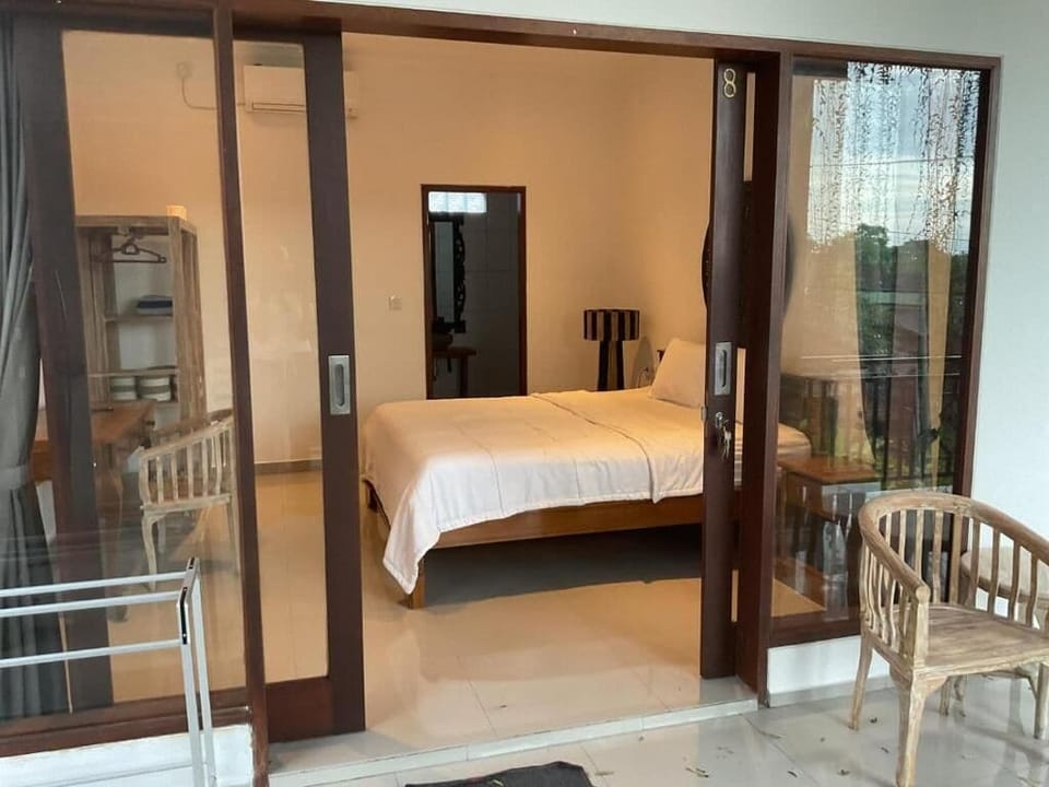 Deluxe Double Room, Balcony, Pool View | Desk, free WiFi