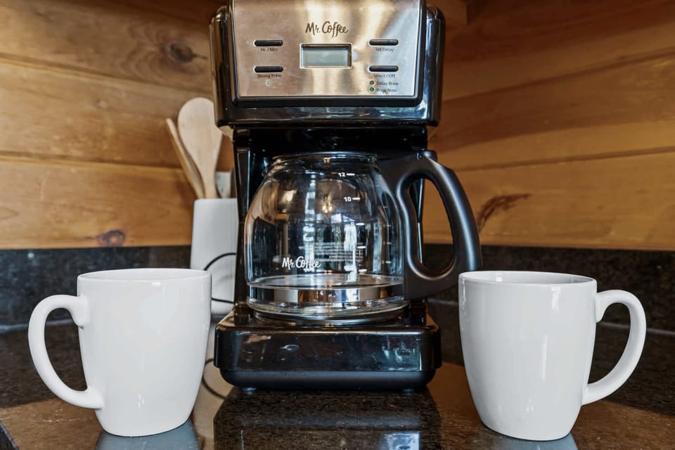 Brew-tiful Mornings Await!
Start your day the cabin way—with a fresh pot of coffee magic and a side of cozy.