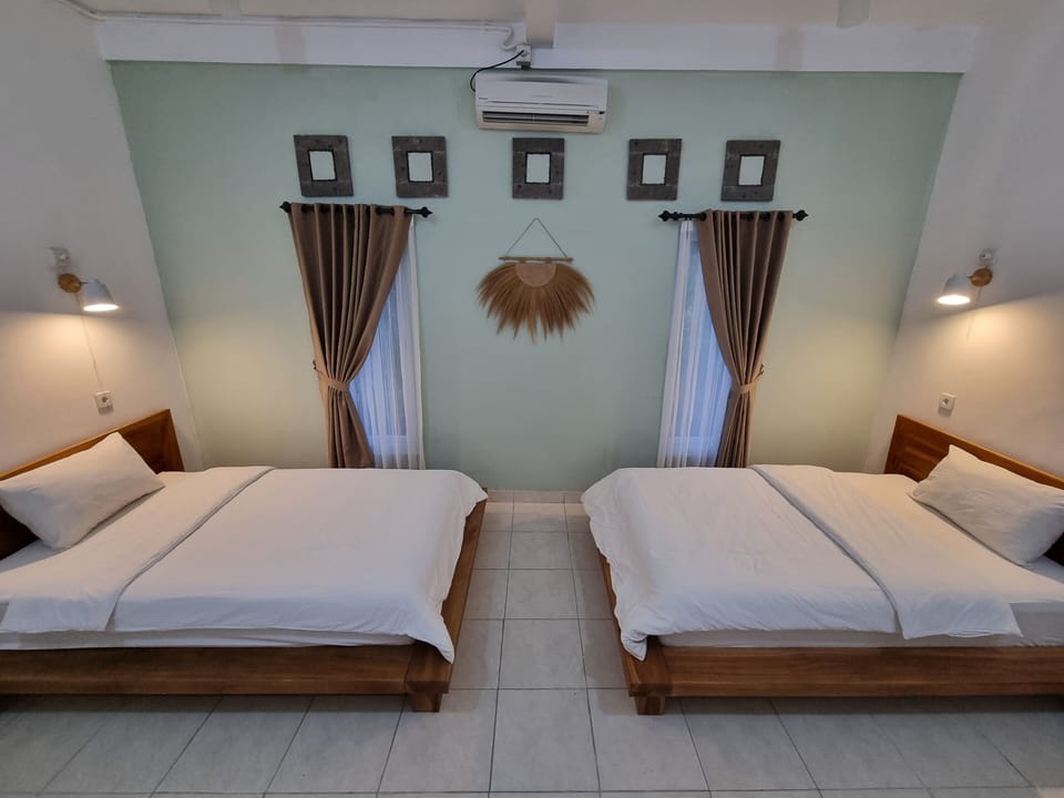Family Triple Room, Balcony, Garden View | Blackout drapes, soundproofing, iron/ironing board (on request)