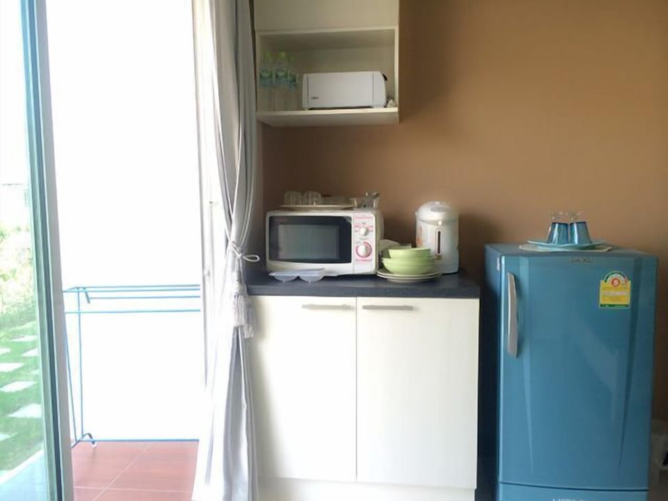 Family Room | Private kitchenette | Full-size fridge, microwave