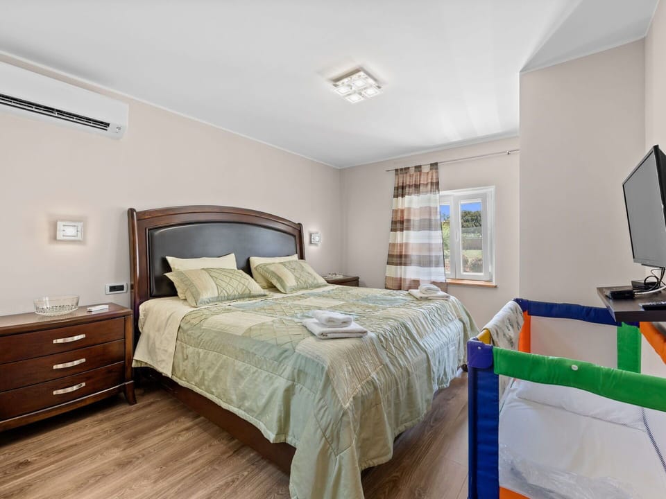 Furniture, Bed, Interior Design, Bedroom, Floor, Flooring, Ceiling, Wood, Room, Bedding
