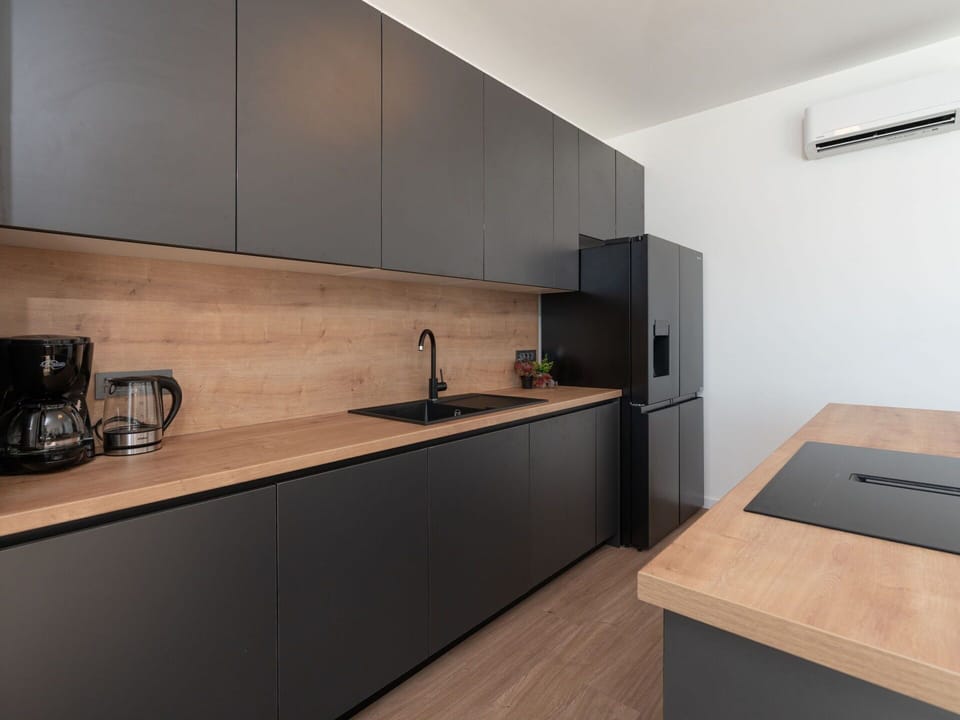 Countertop, Kitchen, Interior Design, Flooring, Furniture, Wood, Cabinetry, Kitchen Appliance, Floor, Home