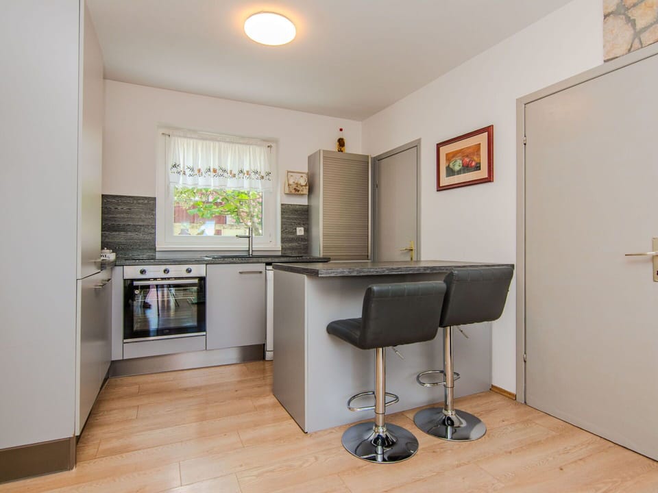 Furniture, Interior Design, Flooring, Wood, Floor, Kitchen, Countertop, Home, Room, Cabinetry