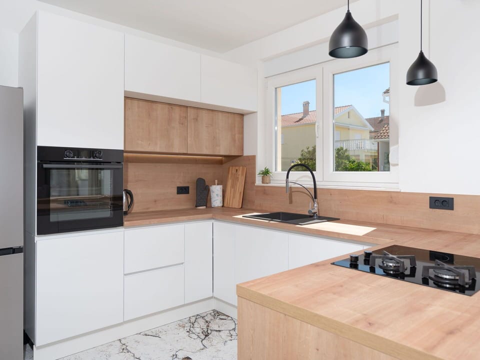 Kitchen, Countertop, Kitchen Appliance, Cabinetry, Furniture, Interior Design, Flooring, Floor, Wood, Major Appliance