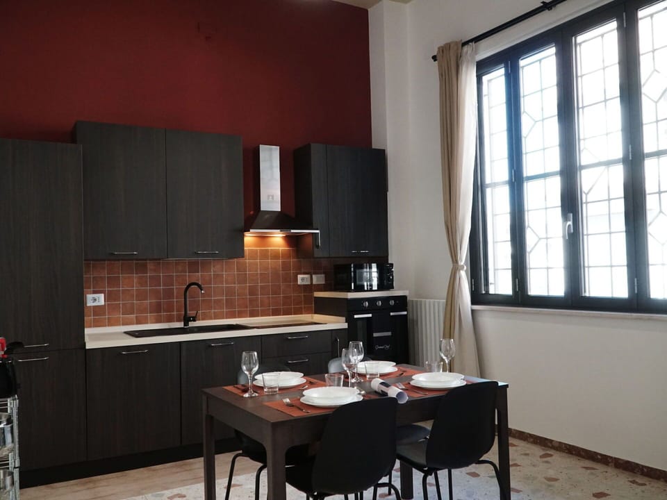Furniture, Interior Design, Kitchen, Flooring, Kitchen Appliance, Floor, Major Appliance, Lighting, Ceiling, Countertop