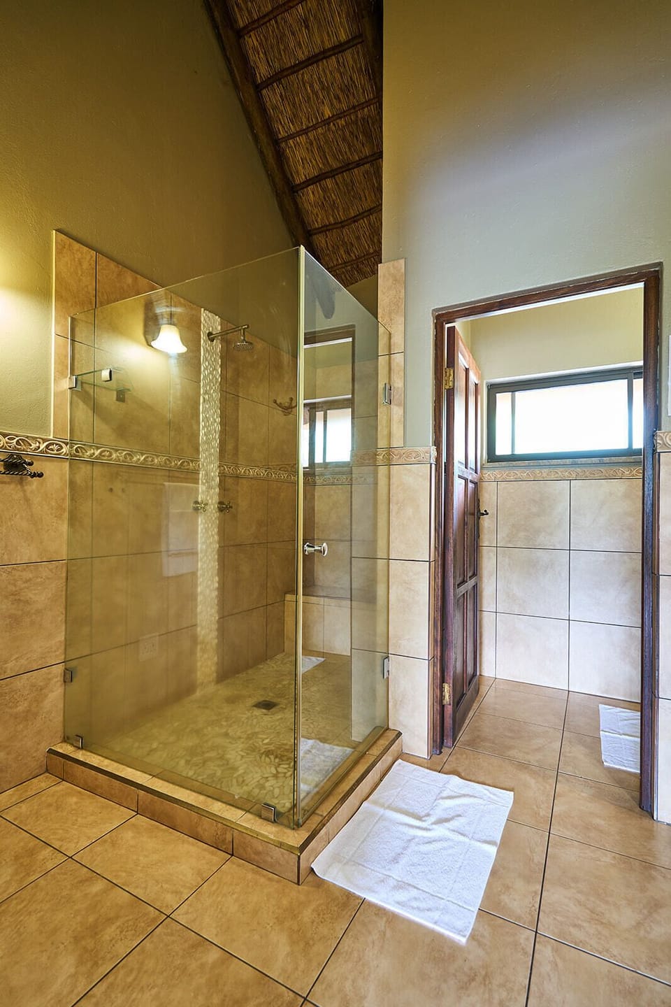 Deluxe Single Room, Patio, Garden View | Bathroom | Shower, slippers, towels, soap