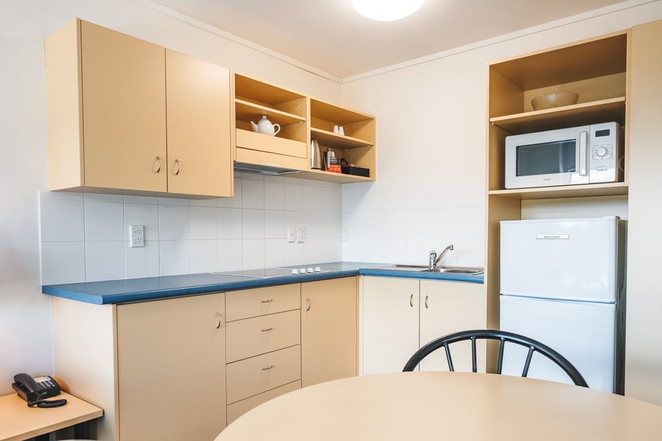 Family Room, 2 Bedrooms | Private kitchen | Mini-fridge, microwave, coffee/tea maker, electric kettle