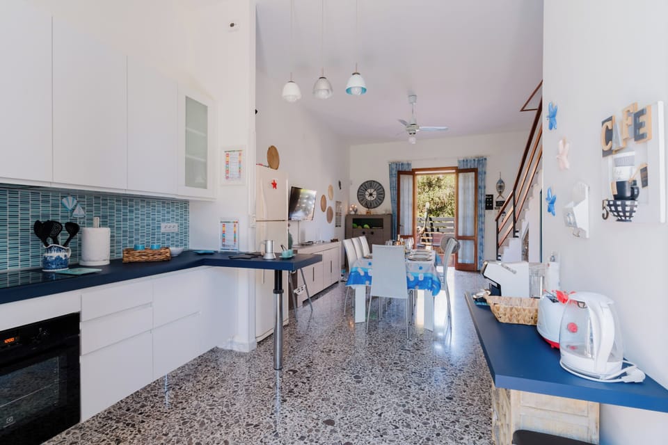 Superior Villa | Private kitchen | Electric kettle, highchair