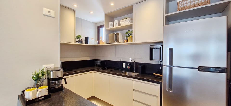 Comfort Apartment | Private kitchen | Fridge, microwave, stovetop, blender