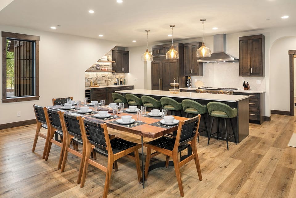 1 More Pool Day. - Comfortable seating for up to 8 at the dining table with additional seating for 6 at the kitchen island.
