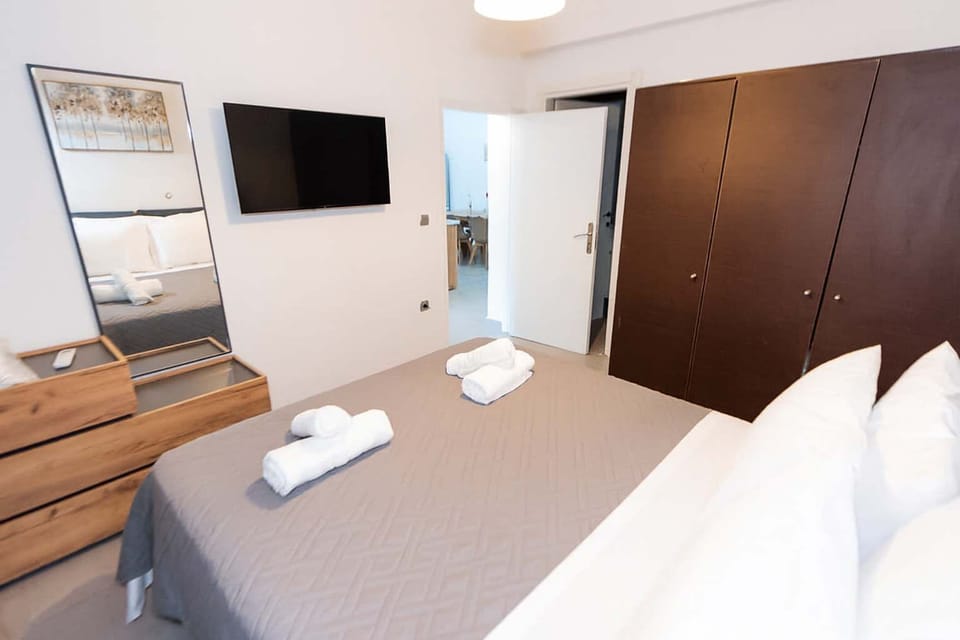 Bedroom with King bed and dresser