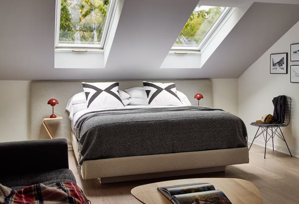 Recharge beneath skylights in a plush bed made for sleep.