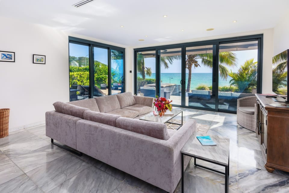 Soak up ocean breezes through expansive glass doors all day.