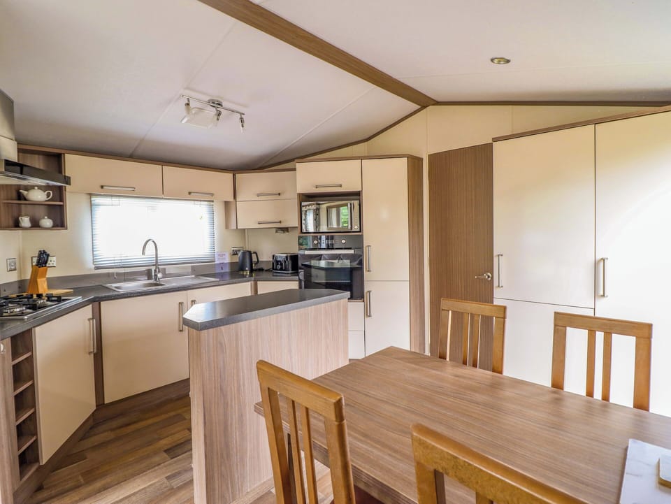Fridge, microwave, toaster, cookware/dishes/utensils