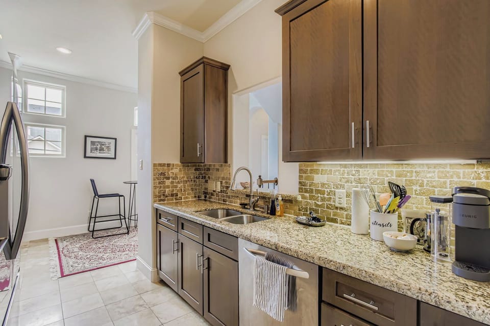 Modern kitchen with sleek finishes, stainless steel appliances