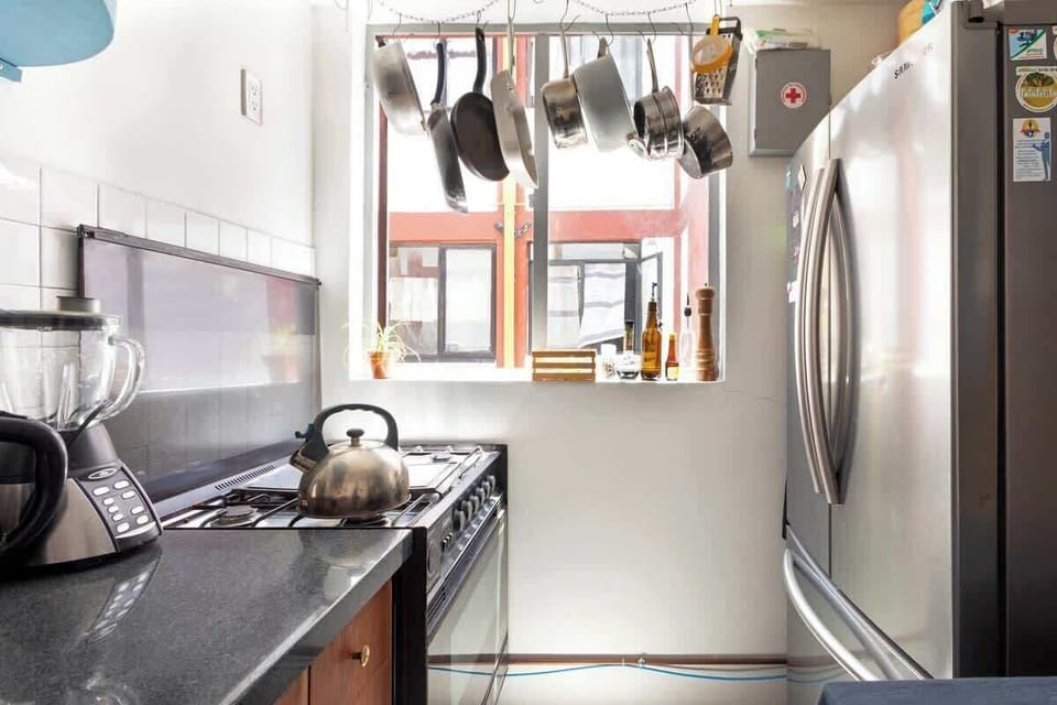 Six-burner stove, oven and three-door refrigerator