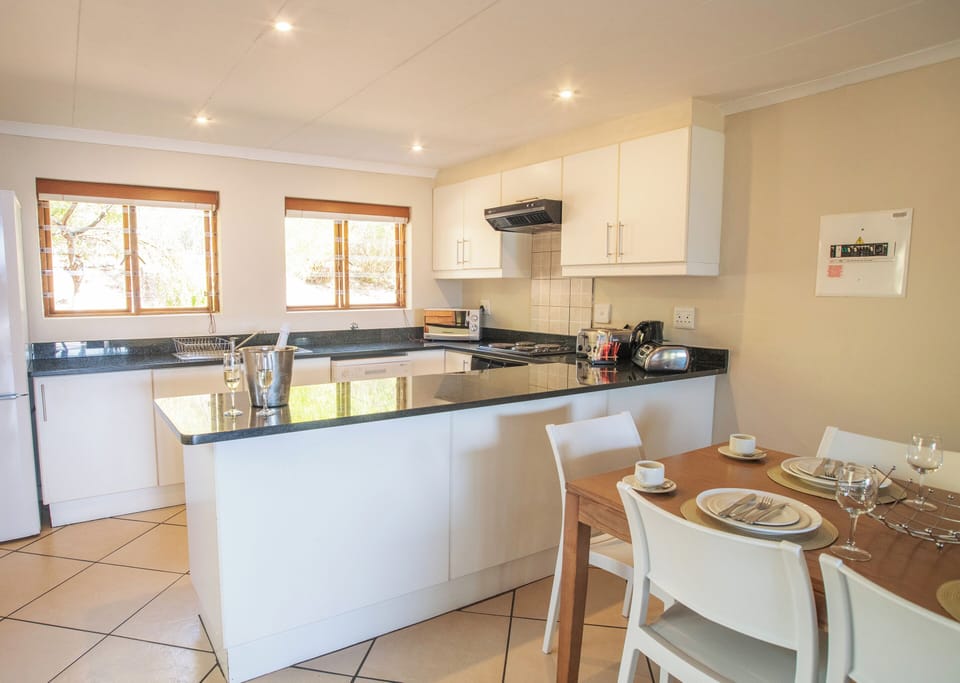 Coffee/tea maker, electric kettle, dining tables