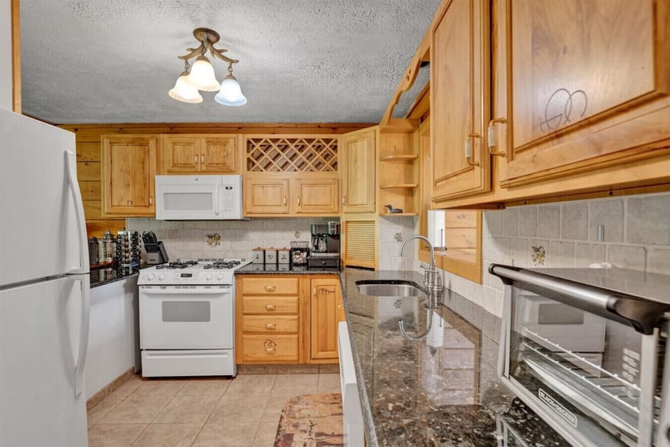 Fully equipped kitchen with modern appliances—everything you need to cook, bake, and enjoy home-cooked meals during your stay.