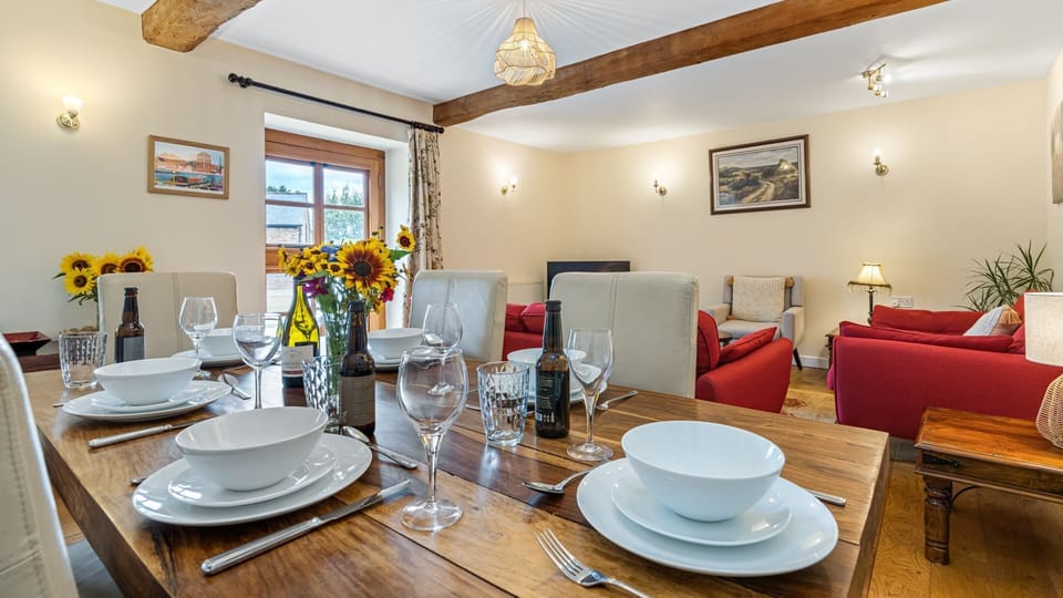 The exposed beams add period character to the living space.