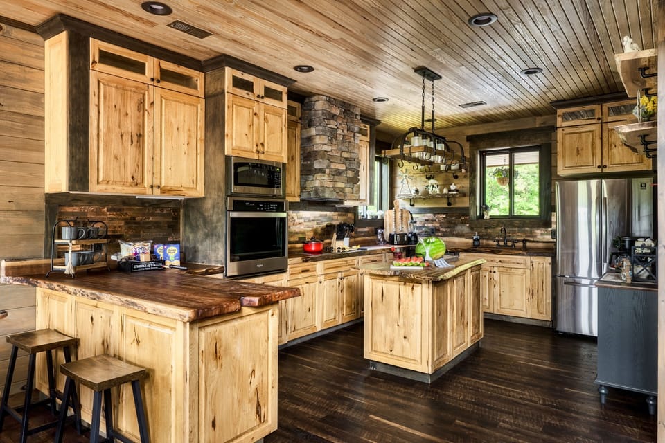 Spacious layout with stone accents and island seating.