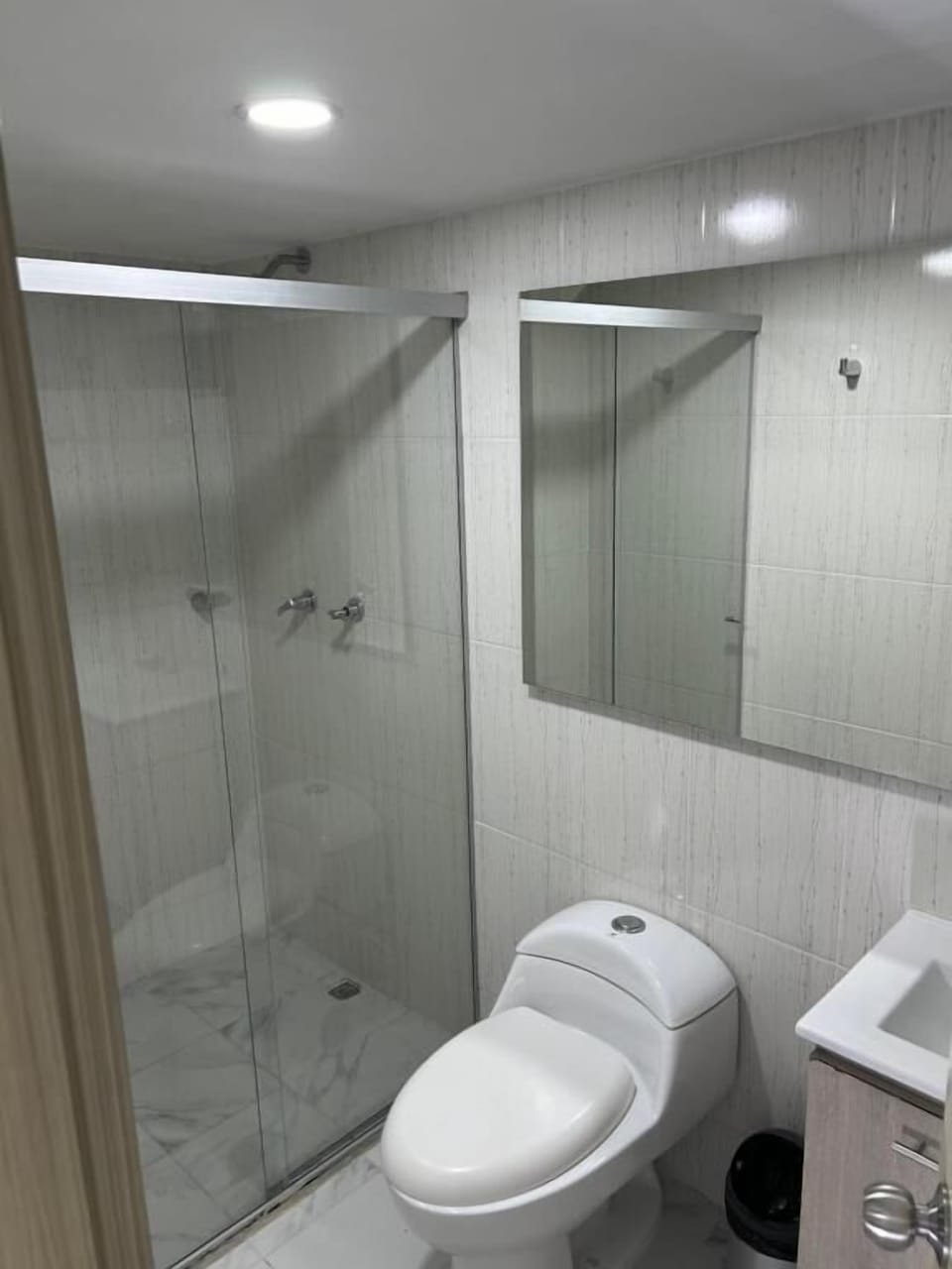 Shower, free toiletries, towels, toilet paper