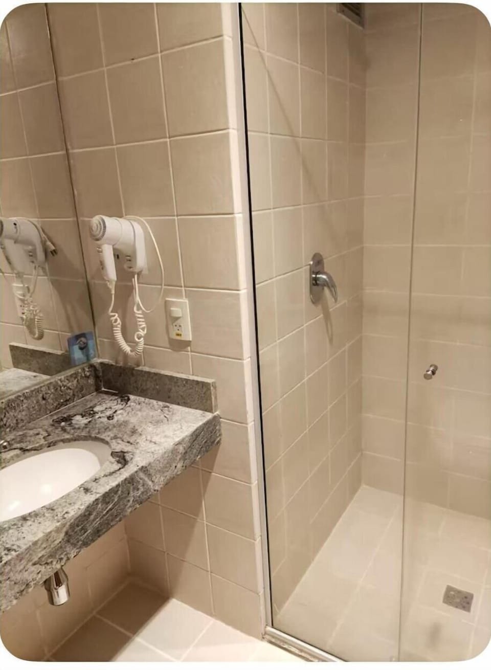 Basic Apartment | Bathroom | Shower, towels, soap, shampoo