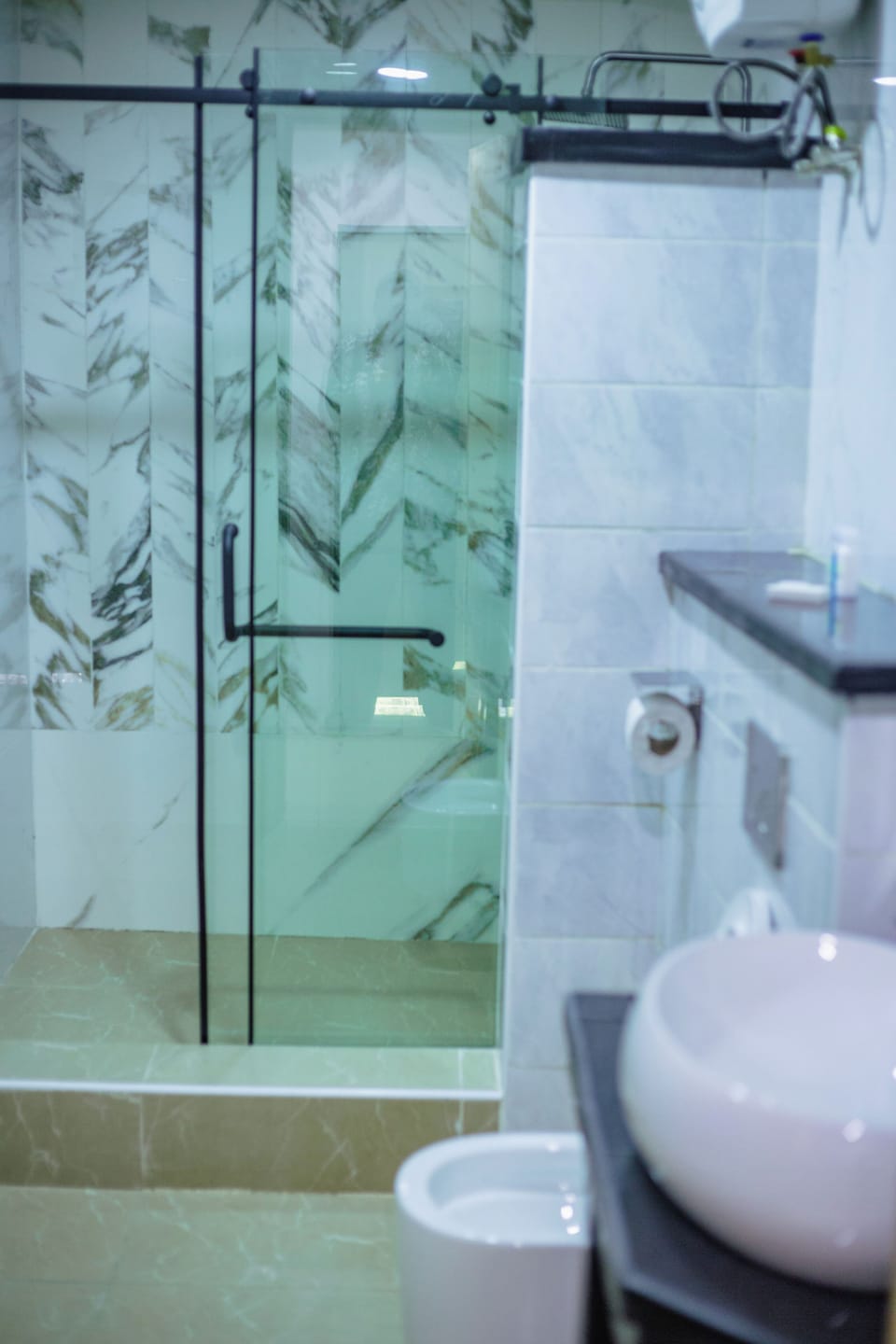 Shower, towels, soap, shampoo