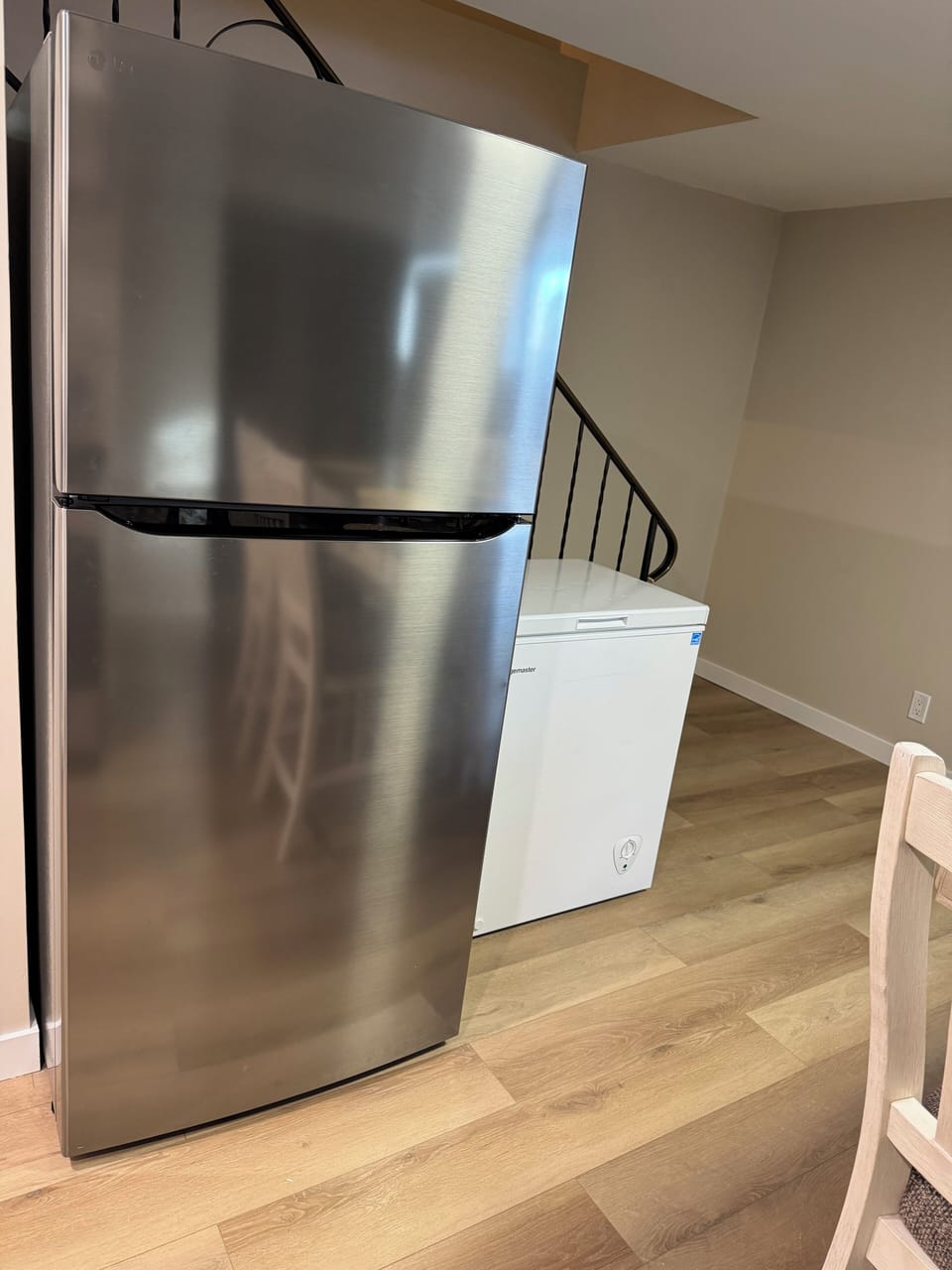 Full size fridge & freezer with additional deep freezer.