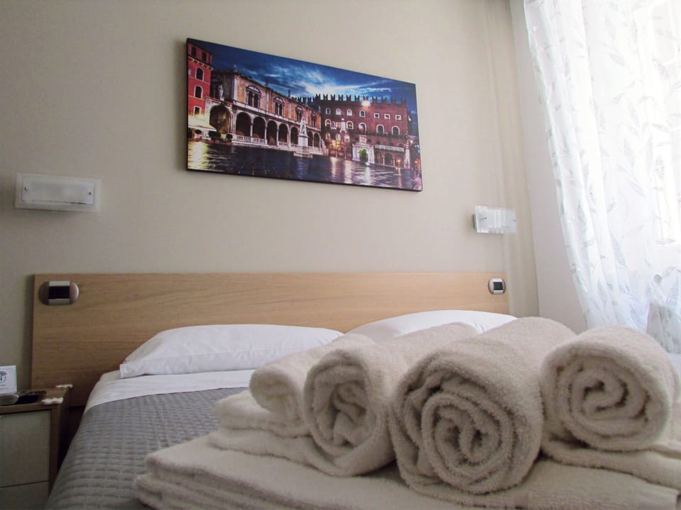 Frette Italian sheets, premium bedding, down comforters, pillowtop beds