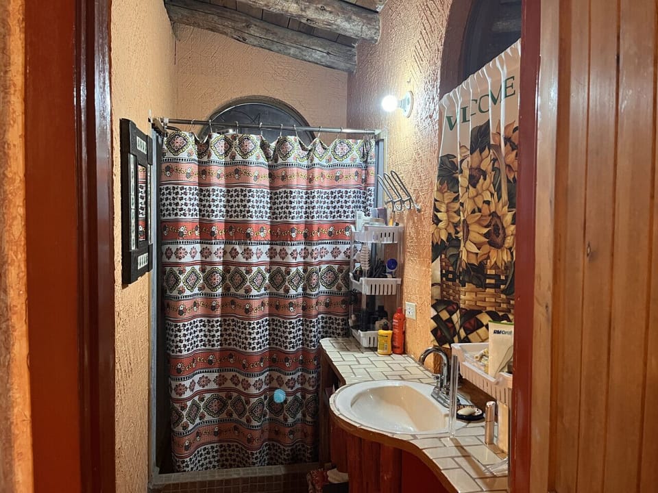 Enjoy a roomy, inviting bathroom during your stay