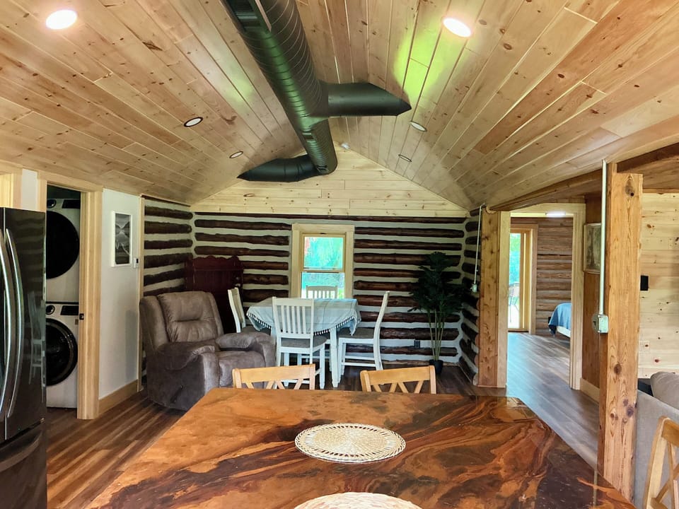 Large kitchen area and seating at both island and dining table